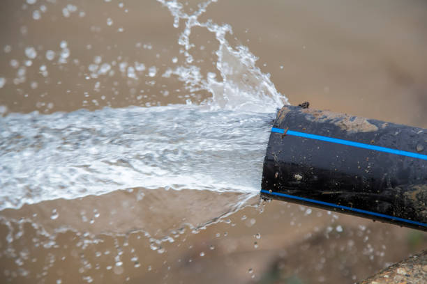 istock Pumping  back flood water into the river 883712940