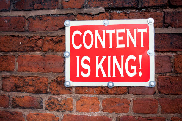 istock Hand writing text caption inspiration showing Content Is King concept meaning Business Marketing Online Media written on old announcement road sign with background and copy space 883729720