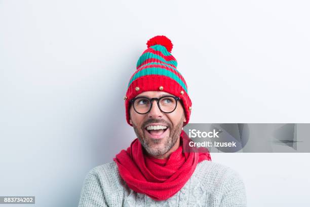 Funny Christmas Portrait Of Nerdy Man Wearing Elf Cap Stock Photo - Download Image Now