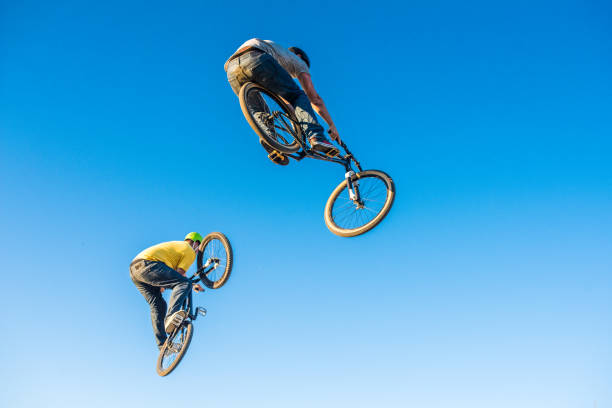 istock Men enjoying dirt jumping sport 883734246
