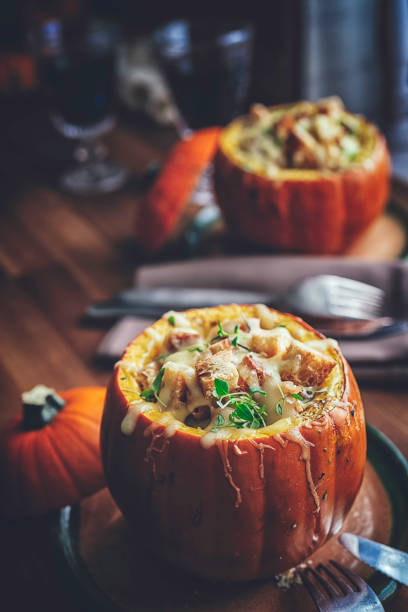 istock Pumpkin Risotto Baked with Cheese in a Pumpkin 883741150
