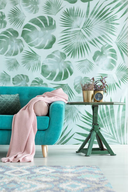 istock Leaves wallpaper in living room 883741198