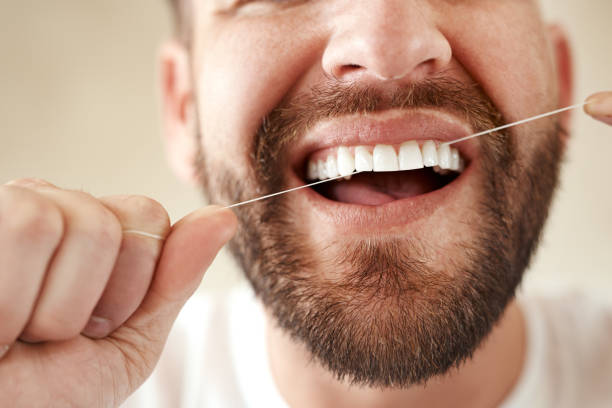 istock Flossing my way to healthier teeth 883744248