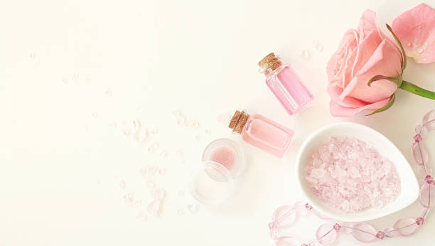 istock Aromatherapy. Small glass bottles with cosmetic oils. Bath salt 883744882