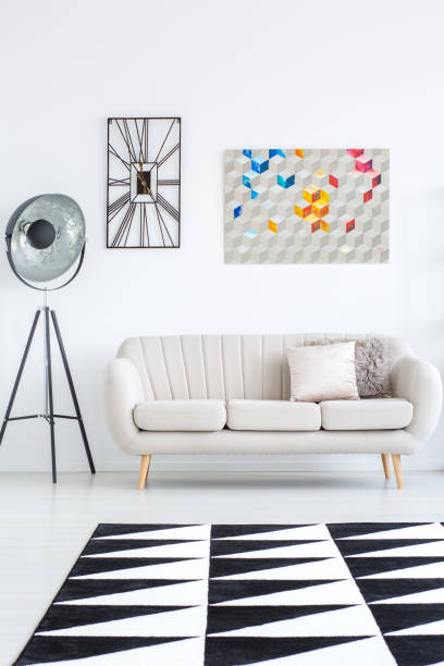 istock Living room with geometric carpet 883751540