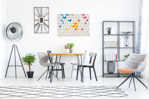 istock Designer dining room with chairs 883751560