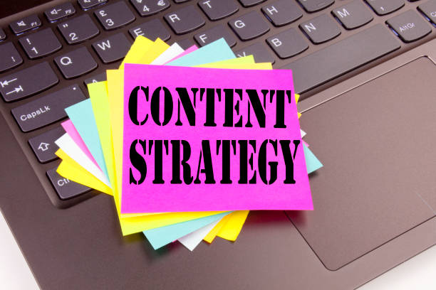 istock Writing Content Strategy text made in the office close-up on laptop computer keyboard. Business concept for Network Website Information Management Workshop on the black background with copy space 883754384