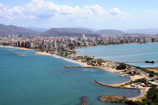 istock Puerto la Cruz from hill nearby 883755384