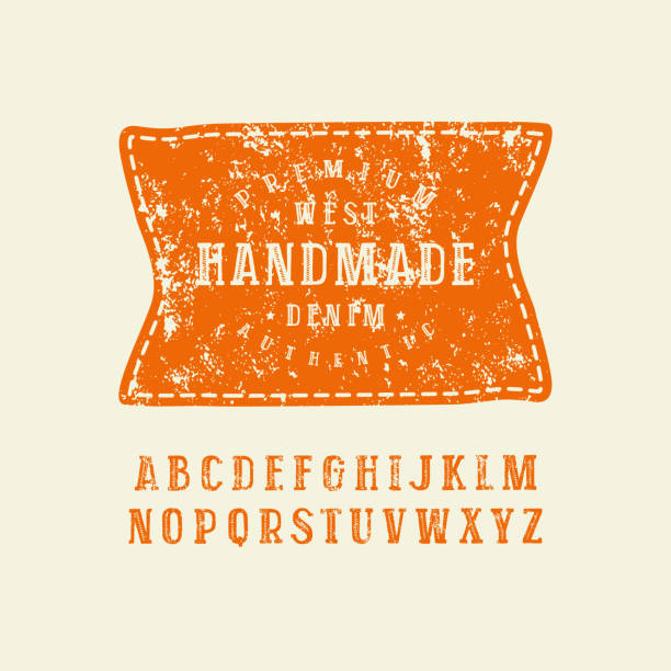 ilustrações de stock, clip art, desenhos animados e ícones de serif font in the style of handmade graphics - leather patch denim jeans