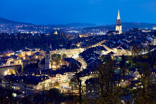 Aerial view of Bern's old town cityscape at dusk, Switzerland.