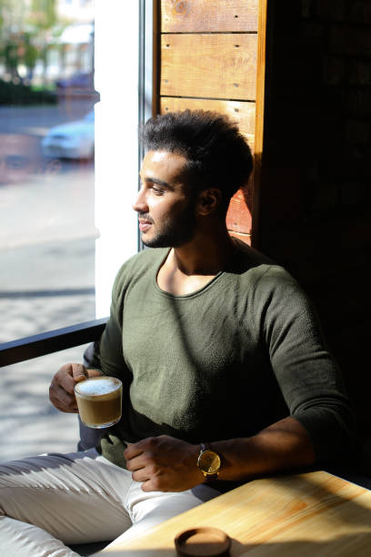 istock Journalist drinking coffee in lunch time, slow motion 883765054