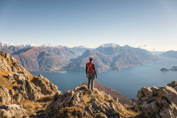 istock Alpinist on top of the mountain 883766052