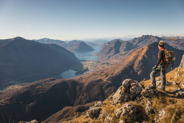 istock Hiker alone on top of the mountain 883766098