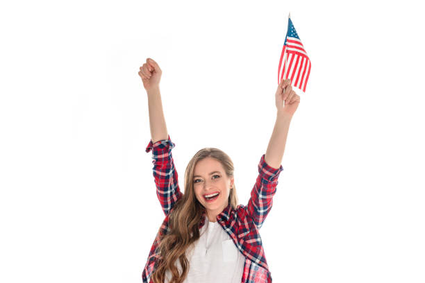 istock young woman with american flag 883769632