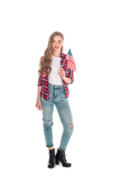 istock young woman with american flag 883770554