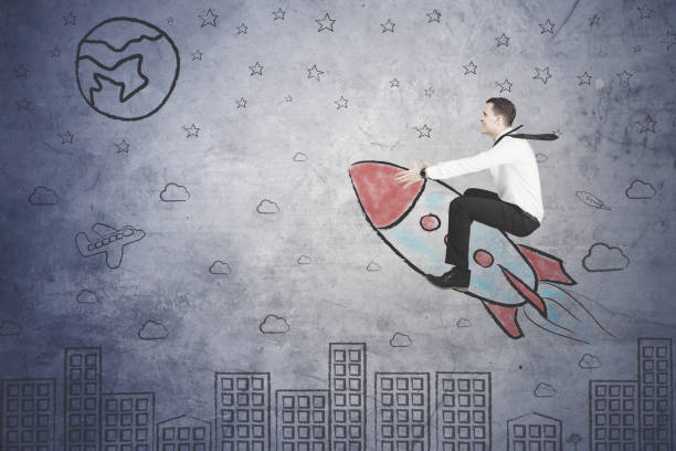 istock American businessman flying with a rocket 883770658