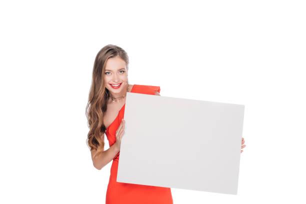 istock young woman with blank banner 883774442