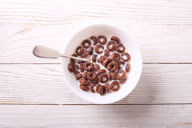 istock Cereal for Breakfast is on the table. Delicious rings from milk 883774888