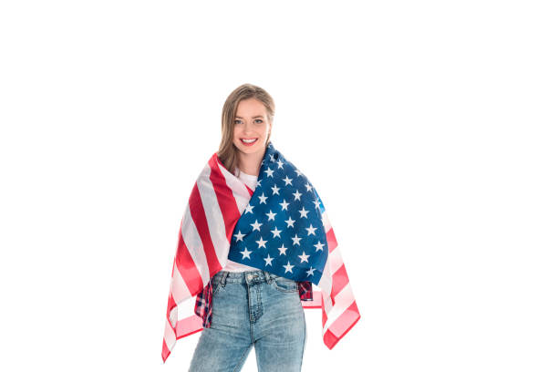 istock young woman with american flag 883775110