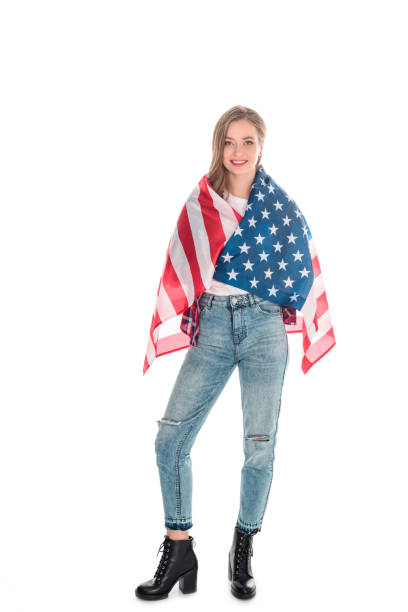 istock young woman with american flag 883775518