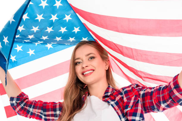 istock young woman with american flag 883775682