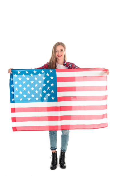 istock young woman with american flag 883776036