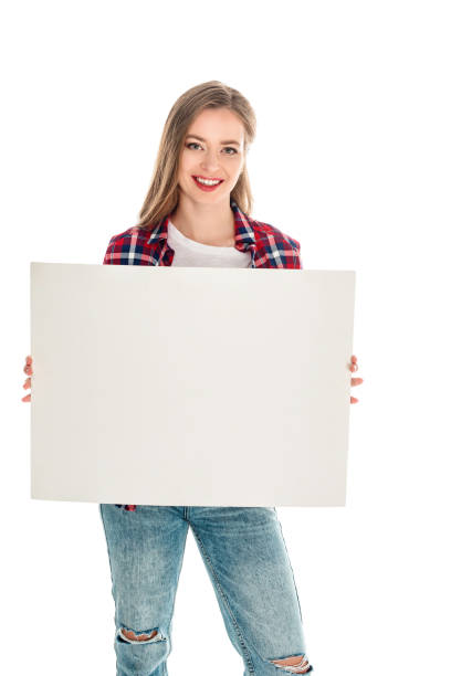 istock young woman with blank banner 883776974