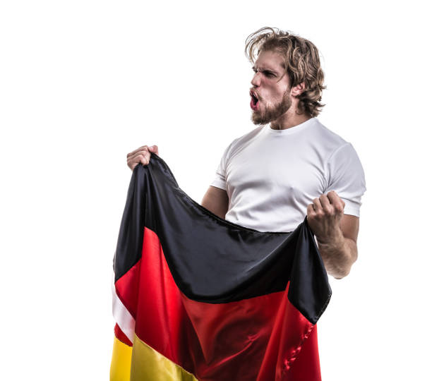 istock German male athlete / fan celebrating on white background 883790890