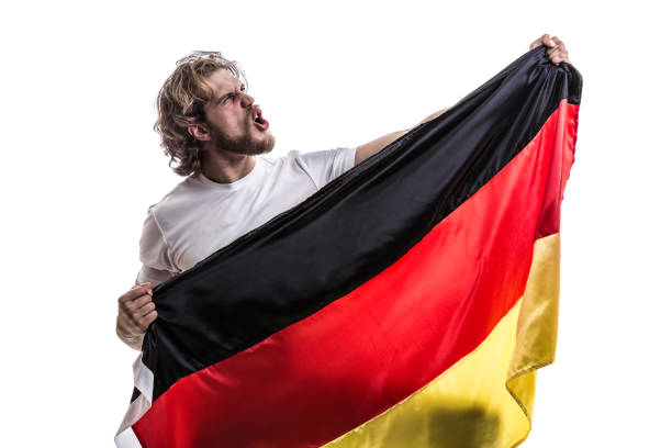 istock German male athlete / fan celebrating on white background 883792552