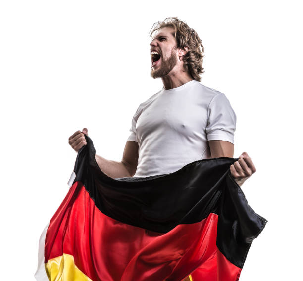 istock German male athlete / fan celebrating on white background 883792850