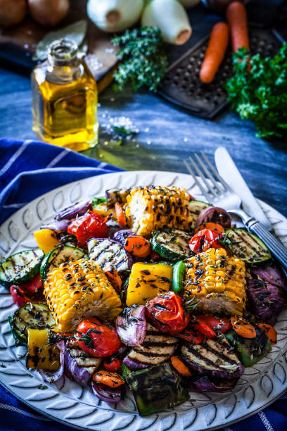 istock Grilled vegetables plate shot on bluish kitchen table 883797308