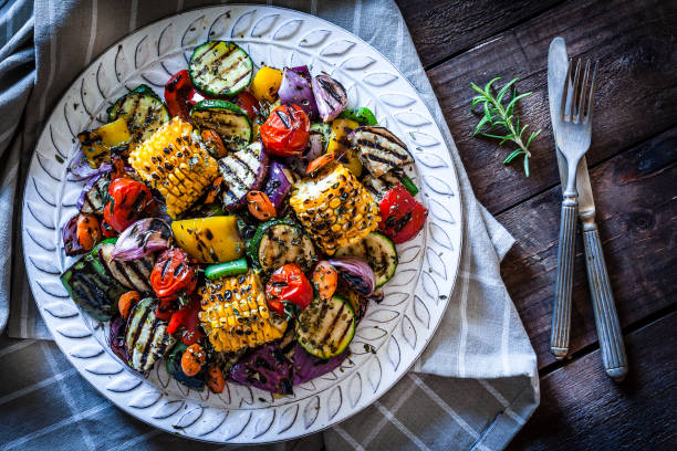 Grilled vegetables plate shot from above on rustic wooden table
