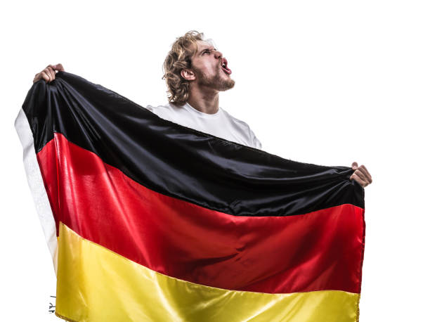 istock German male athlete / fan celebrating on white background 883802472