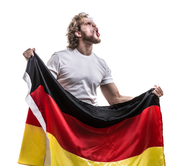 istock German male athlete / fan celebrating on white background 883802478