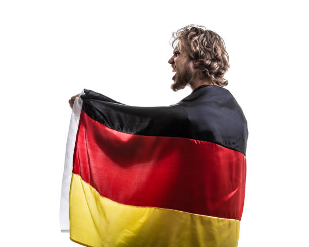 istock German male athlete / fan celebrating on white background 883808280