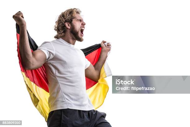German Male Athlete Fan Celebrating On White Background Stock Photo - Download Image Now