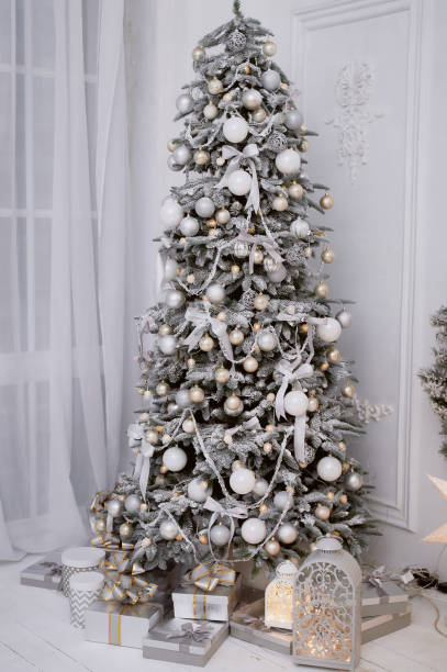 istock Christmas tree decorated white balls and frost 883817456