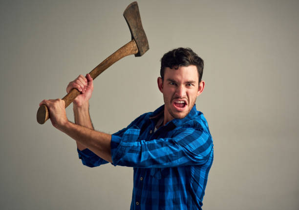 istock It takes strength to chop something down 883818668