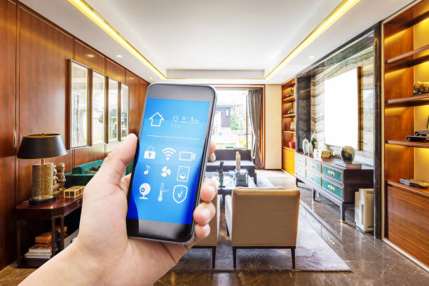 istock smart phone with smart home with modern living room 883823418