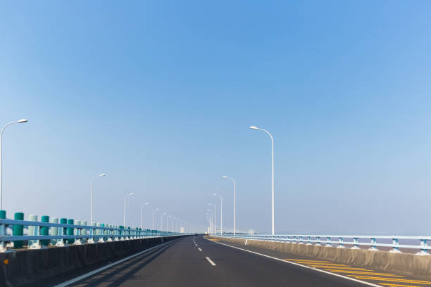 istock bridge spanning the sea in zhoushan 883829986
