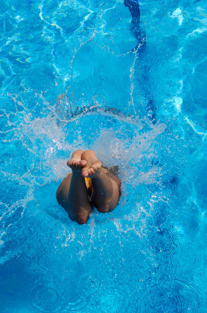 istock Woman enjoying the pool one summer day 883839746