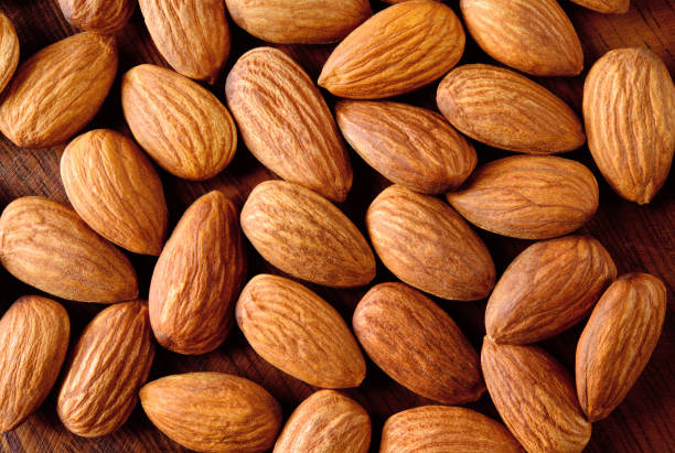 istock Almond. Almonds macro. Almonds background. Almond nuts. 883840464