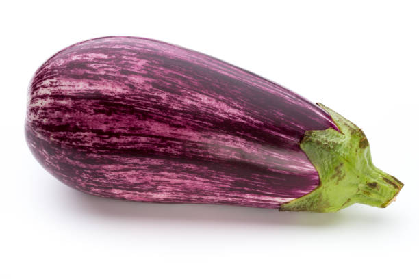 istock Fresh eggplants, aubergine on a white background. 883861900
