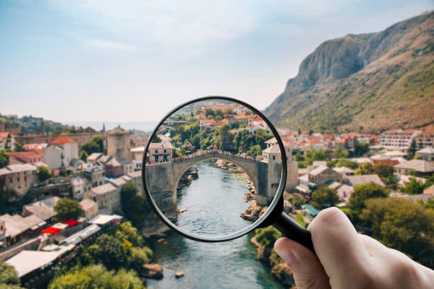 Focusing on Bosnia Focusing on Bosnia - Magnifying glass over the Old town of Mostar in Bosnia & Herzegovina mostar stock pictures, royalty-free photos & images