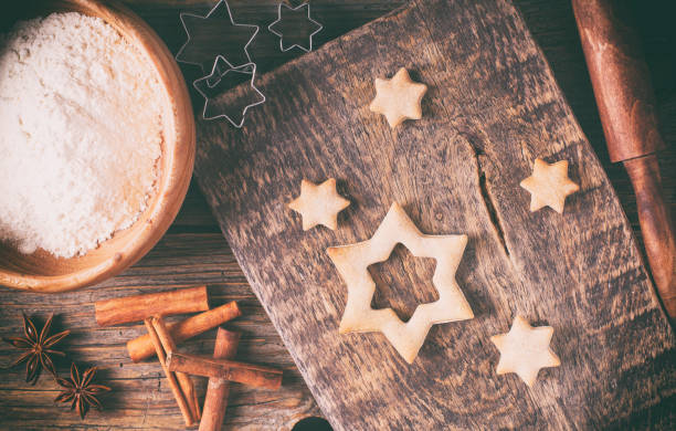 istock Baking cookies for Christmas on rustic wooden table. 883907648