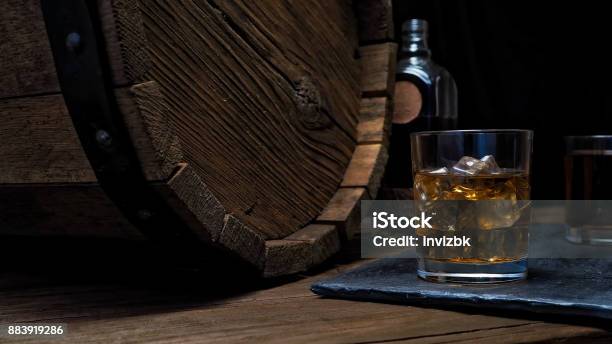 Whiskey On Bar Counter Stock Photo - Download Image Now - Whiskey, Barrel, Bottle