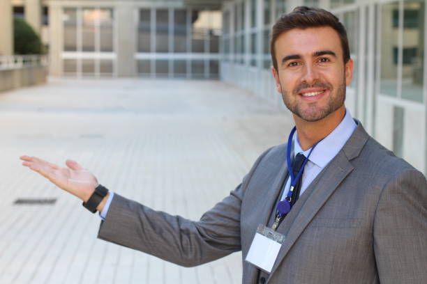 istock Man with a welcoming gesture isolated 883936044