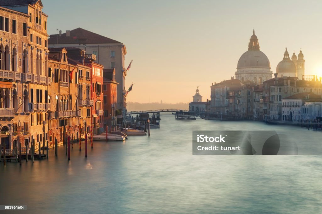 Canals of Venice, Italy Venice is a city in northeastern Italy and the capital of the Veneto region. It is situated across a group of 118 small islands that are separated by canals. Venice - Italy Stock Photo