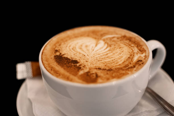 istock Cup Of Cappuccino With Fresh Whipped Cream And Cinnamon On Top 883968614