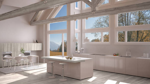 istock Modern kitchen in classic villa, loft, big panoramic windows on autumn meadow, white minimalist interior design 883969578